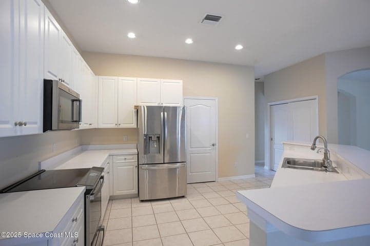 943 Carriage Hill Road, Melbourne, FL 32940 — photo 6
