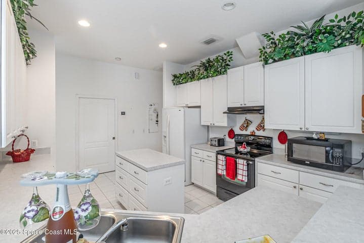 2343 Woodfield Circle, Melbourne, FL 32904 — photo 11