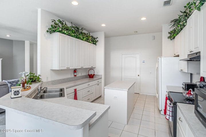 2343 Woodfield Circle, Melbourne, FL 32904 — photo 13