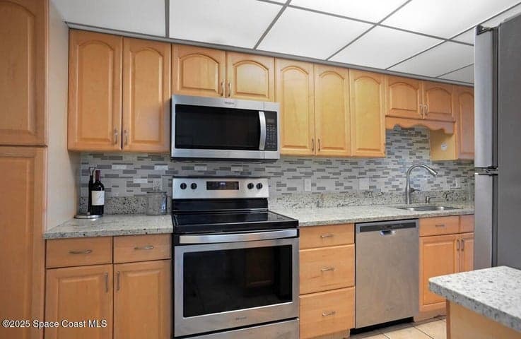 520 E Palm Springs Boulevard E #311, Indian Harbour Beach, FL 32937 — photo 3
