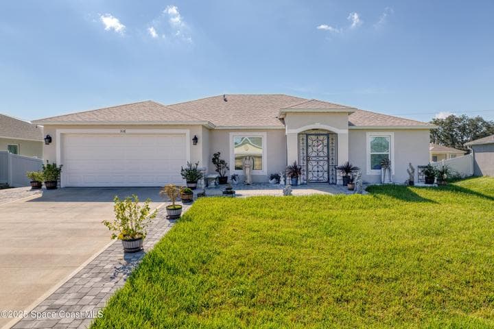 516 Olsmar Street SW, Palm Bay, FL 32908