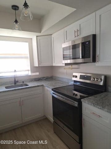 592 N Wickham Road #12, Melbourne, FL 32935 — photo 10