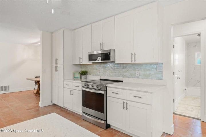 1201 Pawnee Terrace, Indian Harbour Beach, FL 32937 — photo 12
