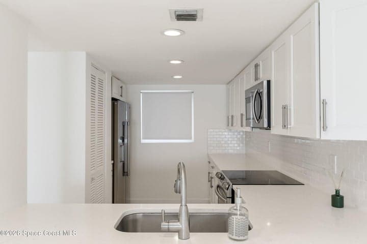 3060 N Atlantic Avenue #404, Cocoa Beach, FL 32931 — photo 10