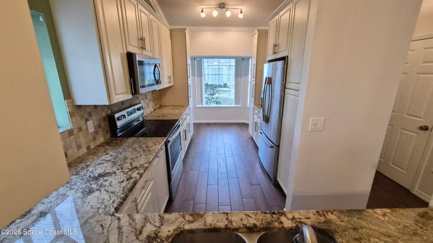 4948 Lake Waterford Way W #203-2, Melbourne, FL 32901 — photo 3