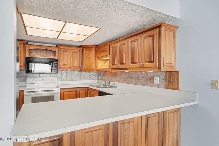 3833 S Banana River Boulevard #303, Cocoa Beach, FL 32931 — photo 13