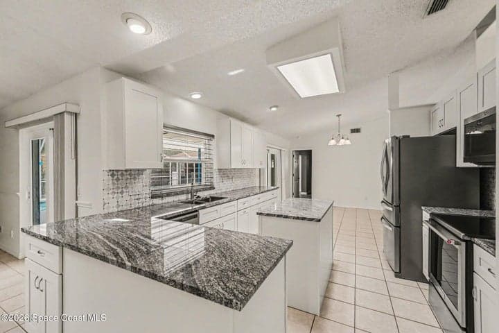 742 Penguin Avenue NE, Palm Bay, FL 32907 — photo 13