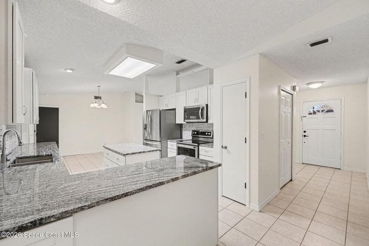 742 Penguin Avenue NE, Palm Bay, FL 32907 — photo 14