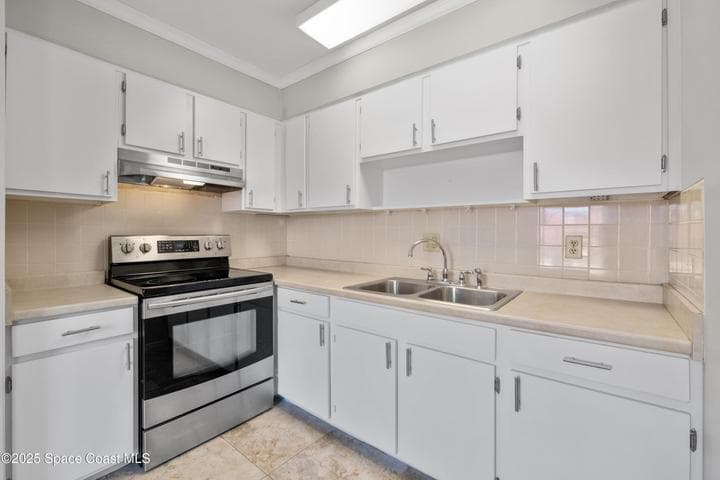 145 E Colonial Court #D, Indian Harbour Beach, FL 32937 — photo 4