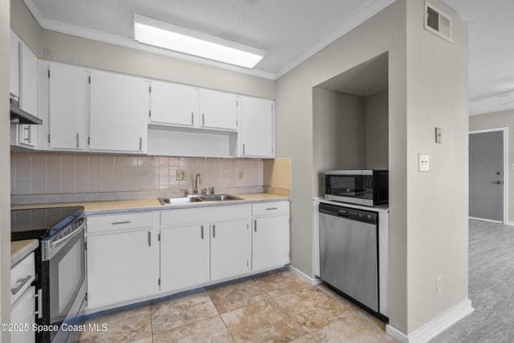 145 E Colonial Court #D, Indian Harbour Beach, FL 32937 — photo 5