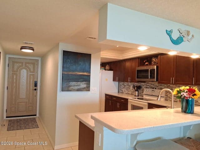 1860 N Atlantic Avenue #B306, Cocoa Beach, FL 32931 — photo 7