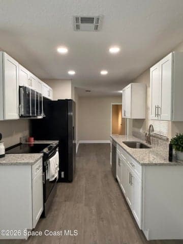 881 Brunswick Lane, Rockledge, FL 32955 — photo 5