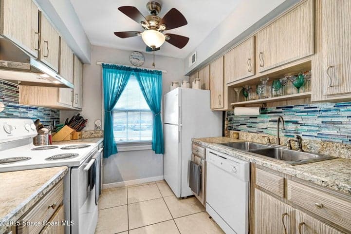 152 E East Colonial Court Court #84, Indian Harbour Beach, FL 32937 — photo 10