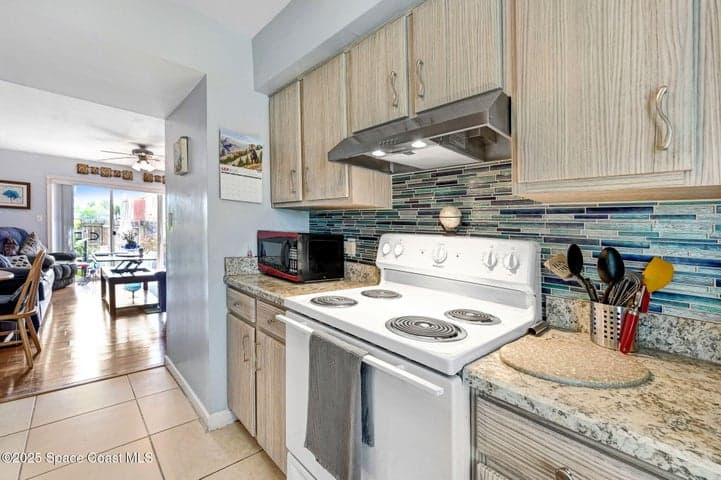 152 E East Colonial Court Court #84, Indian Harbour Beach, FL 32937 — photo 11